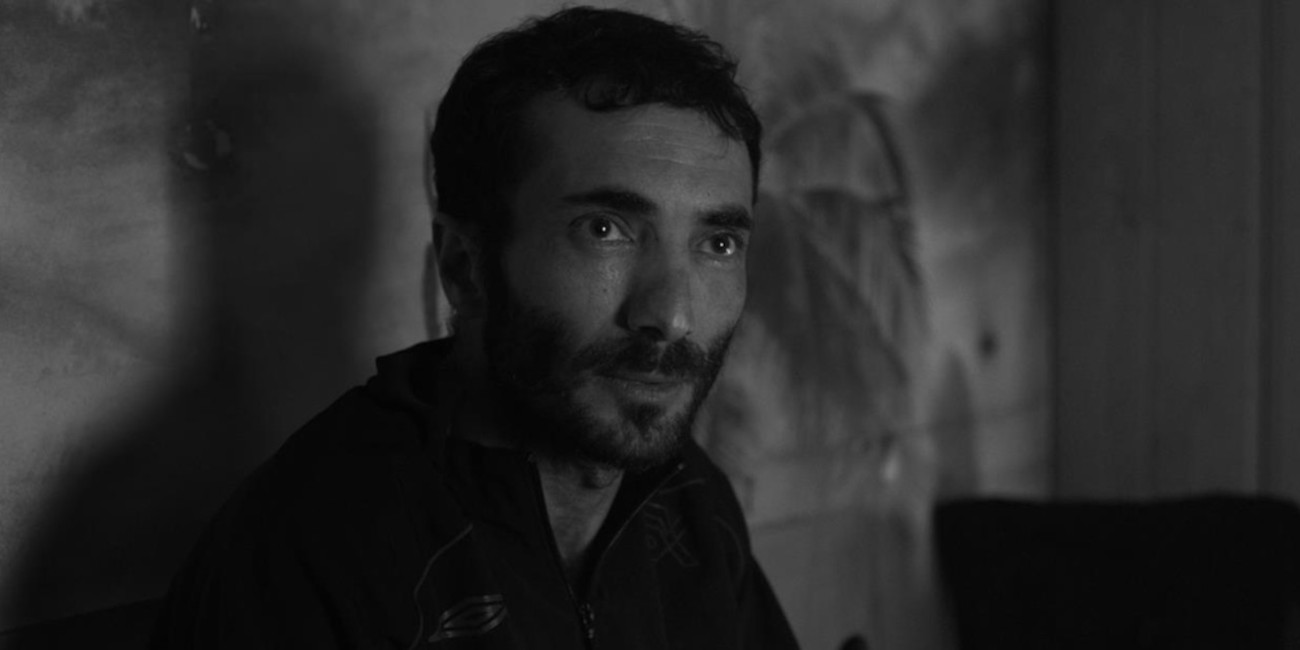 b&w photograph of bearded man