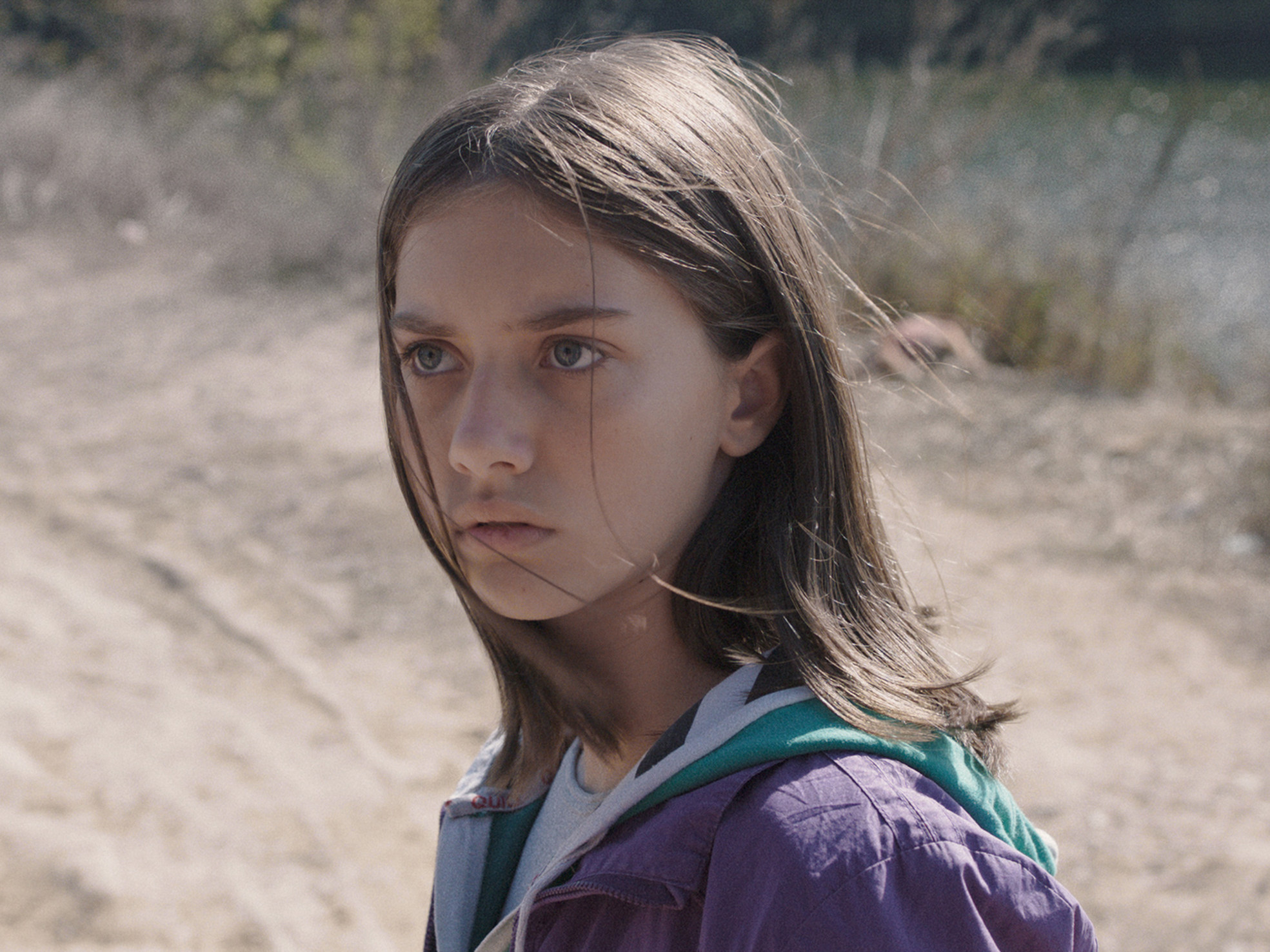 film still of girl in country
