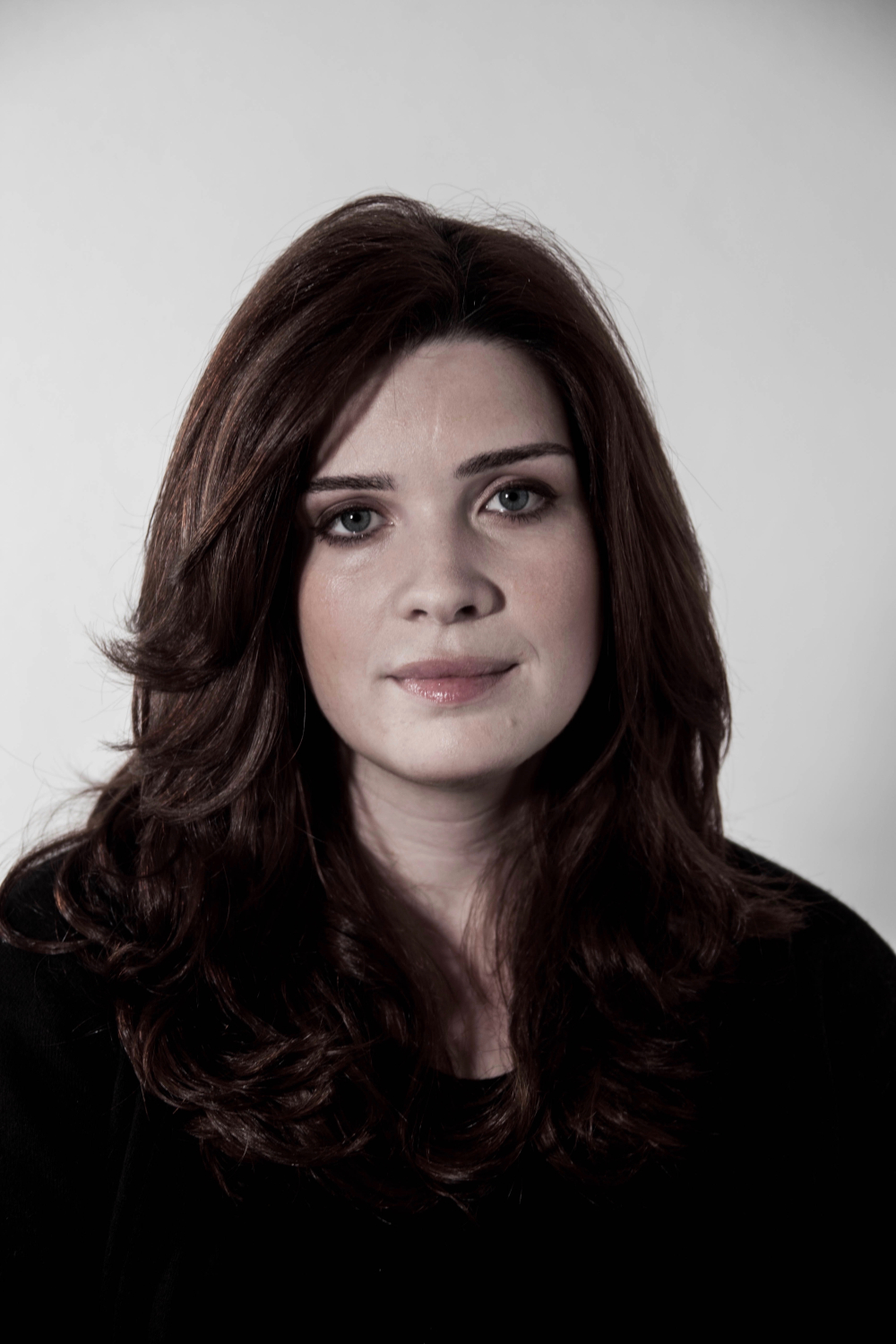 portrait of person with long dark hair