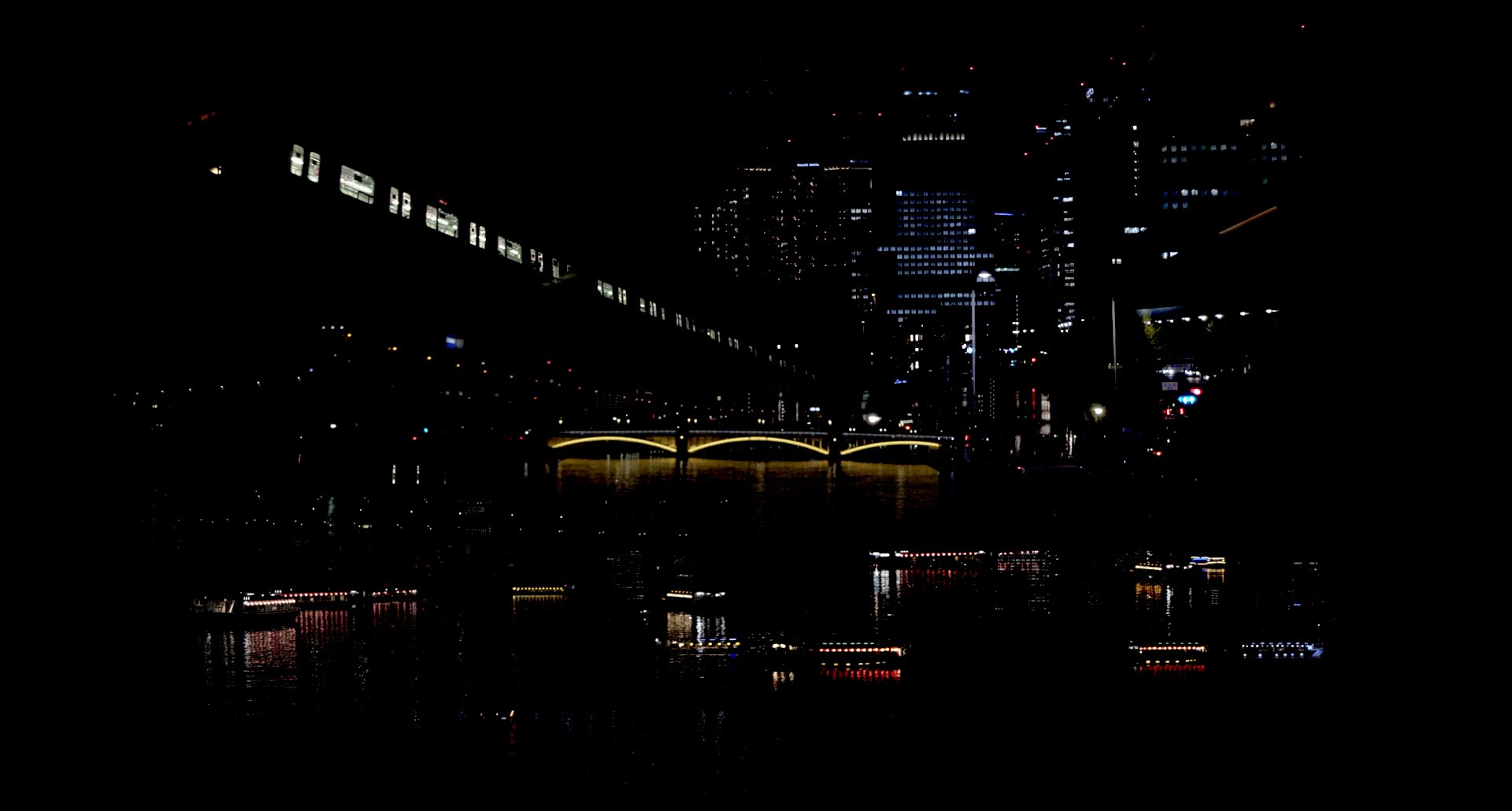film still of a city's night skyline